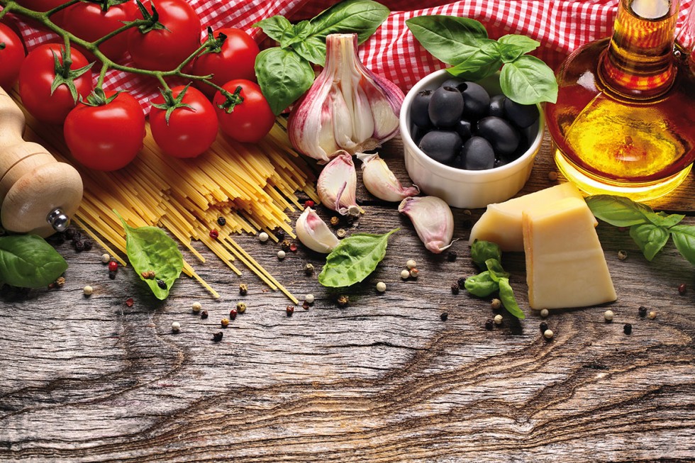 Italian food ingredients on wooden background